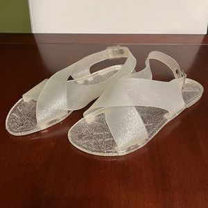 Report Signature jelly sandals NWOT
